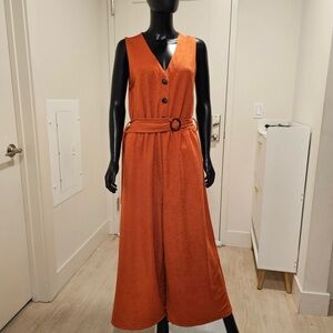 Alice Blue Orange Jumpsuit with V-Neck and Palazzo Legs